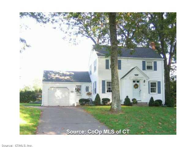 106 Burnbrook Road East Hartford, CT 06118 - Photo 1 of 1 a front view of a house with garden