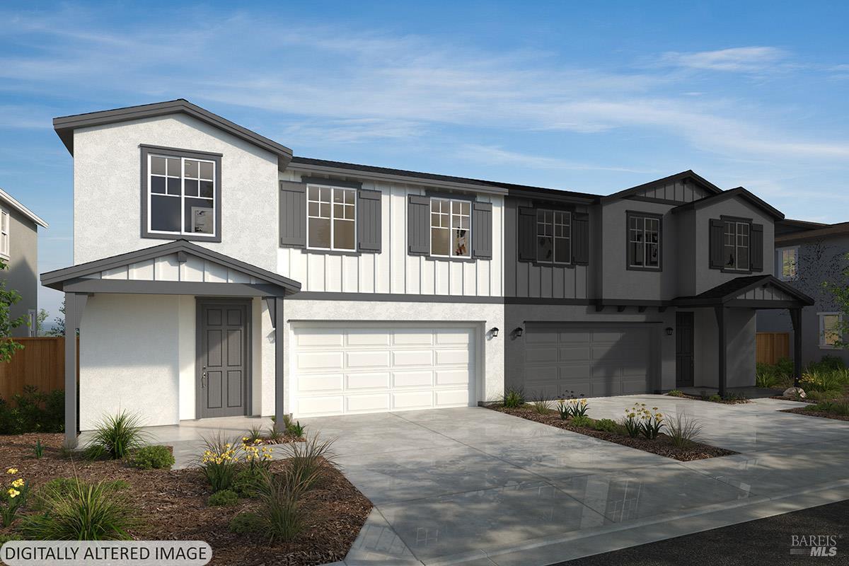 3863 Terrabrook Drive Santa Rosa, CA 95407 - Photo 1 of 4 a front view of a house with a yard and garage