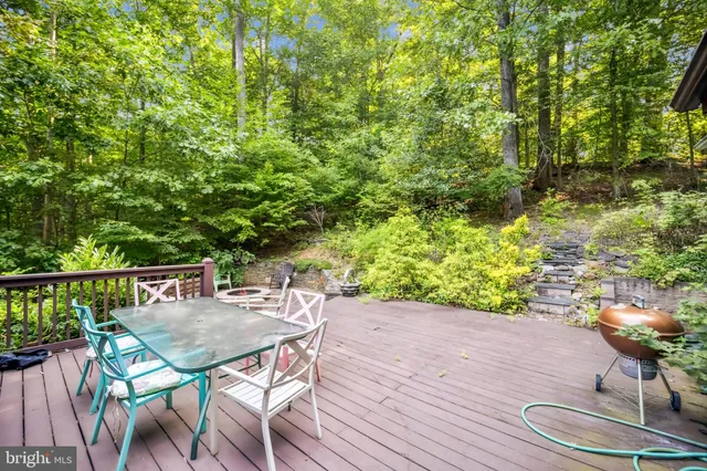 a outdoor living space with furniture and garden view