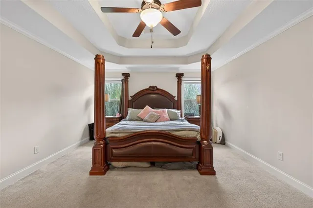 a bedroom with furniture and a window