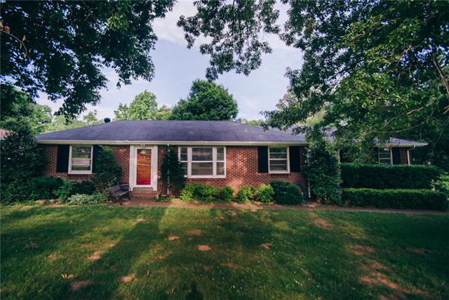 453 Rochelle Drive Nashville, TN 37220 - Photo 1 of 20 front view of a house with a yard