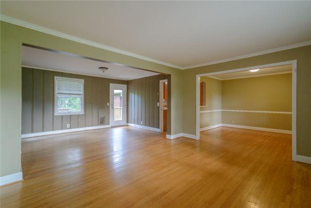 453 Rochelle Drive Nashville, TN 37220 - Photo 11 of 20 a view of an empty room with window and wooden floor