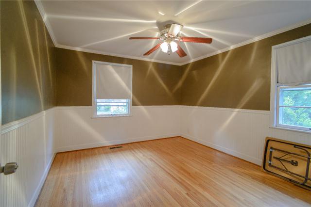 453 Rochelle Drive Nashville, TN 37220 - Photo 17 of 20 a view of an empty room with wooden floor and a window