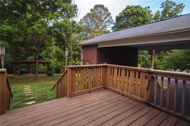 453 Rochelle Drive Nashville, TN 37220 - Photo 4 of 20 a balcony with wooden floor in outdoor space