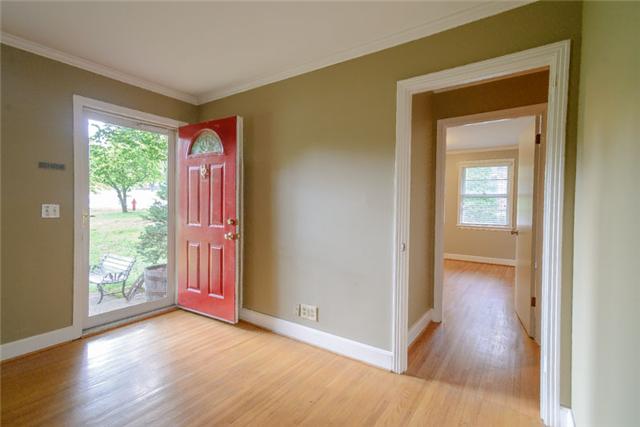 453 Rochelle Drive Nashville, TN 37220 - Photo 5 of 20 a view of a hallway with wooden floor and windows