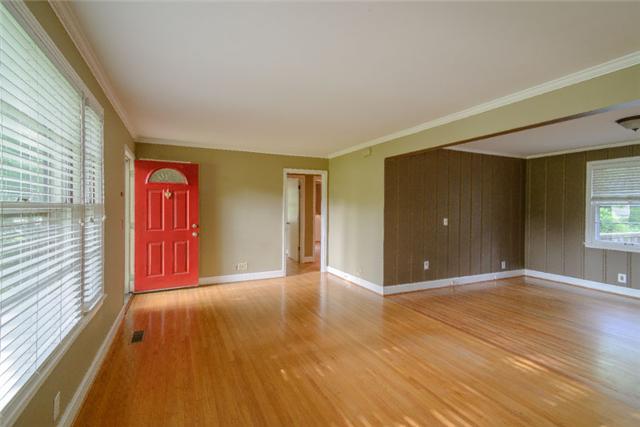 453 Rochelle Drive Nashville, TN 37220 - Photo 6 of 20 a view of an empty room with window and wooden floor