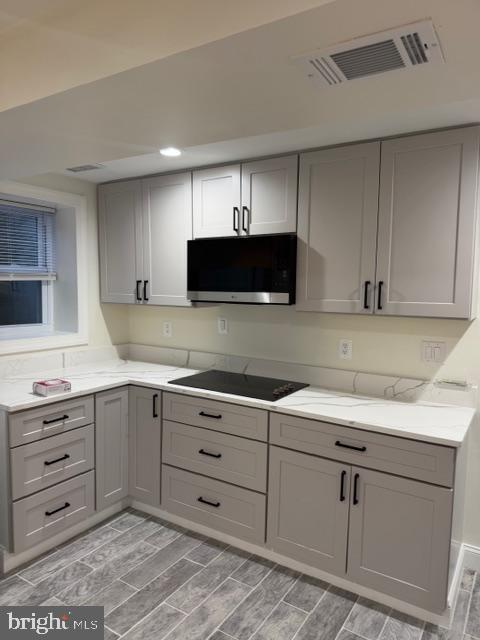 1104 Eastbourne Place Silver Spring, MD 20904 - Photo 3 of 12 a kitchen with cabinets appliances and a sink
