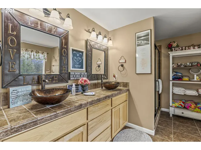 a bathroom with a bathtub and a window