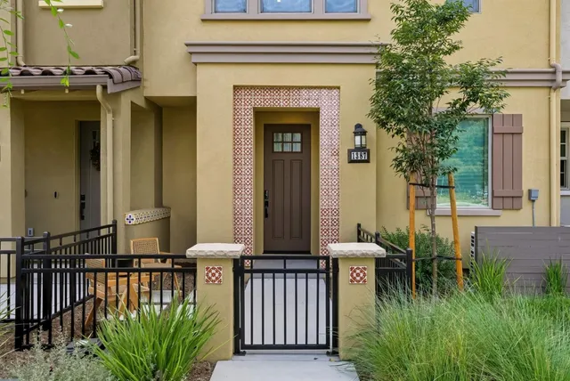 a view of a balcony with chairs