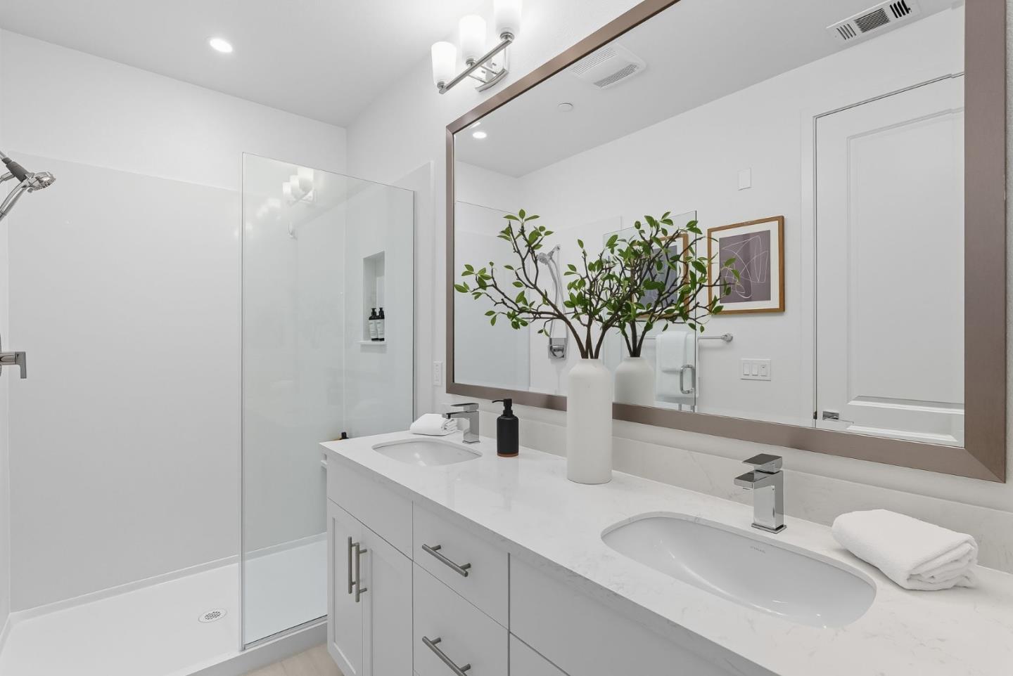 1387 West Middlefield Road Mountain View, CA 94043 - Photo 19 of 28 a bathroom with a sink and a mirror