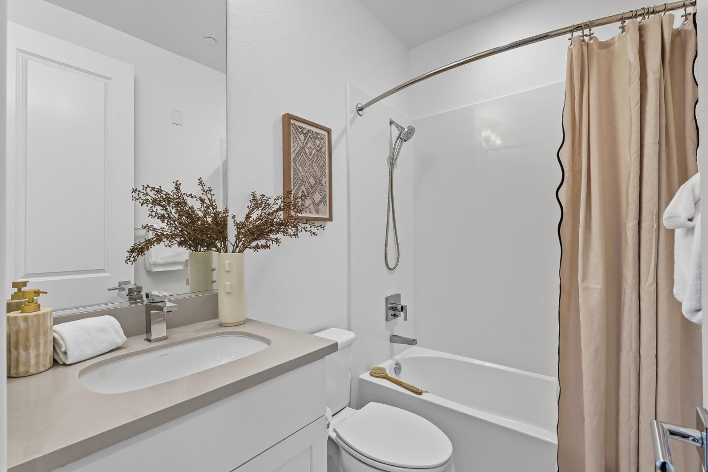 1387 West Middlefield Road Mountain View, CA 94043 - Photo 22 of 28 a bathroom with a sink toilet and shower