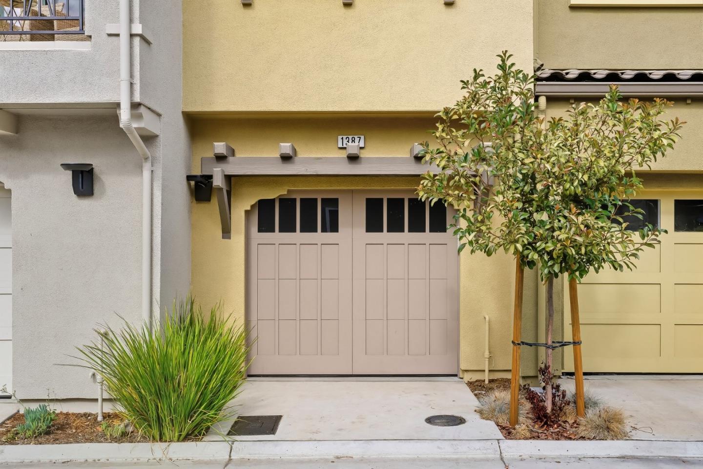 1387 West Middlefield Road Mountain View, CA 94043 - Photo 25 of 28 a front view of a house with a yard