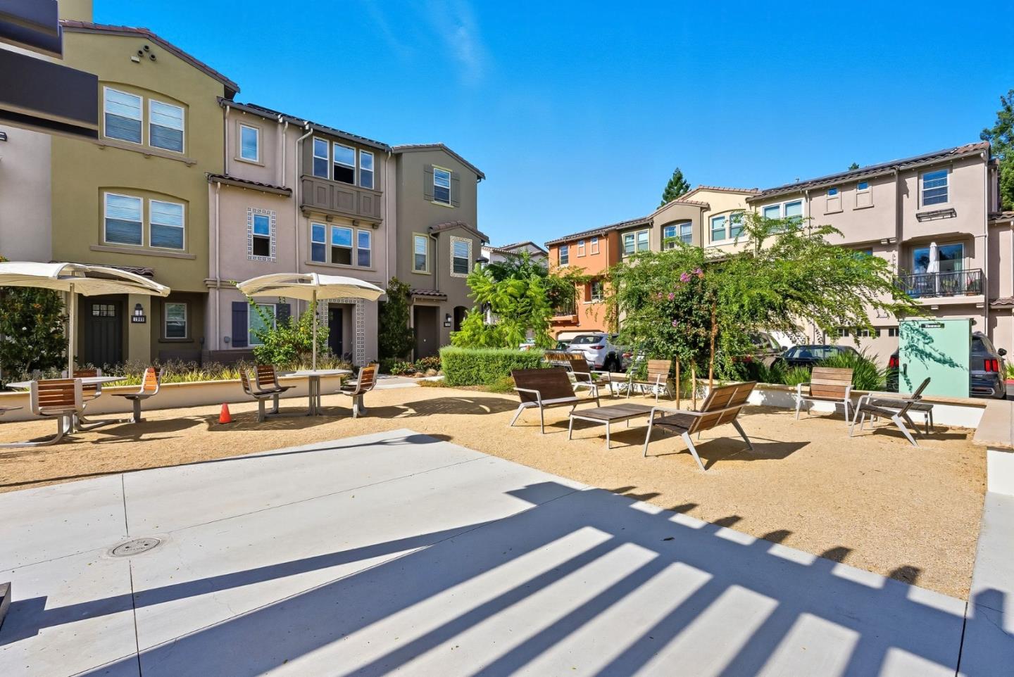 1387 West Middlefield Road Mountain View, CA 94043 - Photo 27 of 28 a view of a swimming pool with outdoor seating