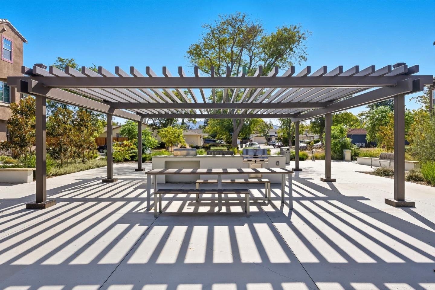 1387 West Middlefield Road Mountain View, CA 94043 - Photo 28 of 28 a view of patio with table and chairs a barbeque with wooden floor and fence