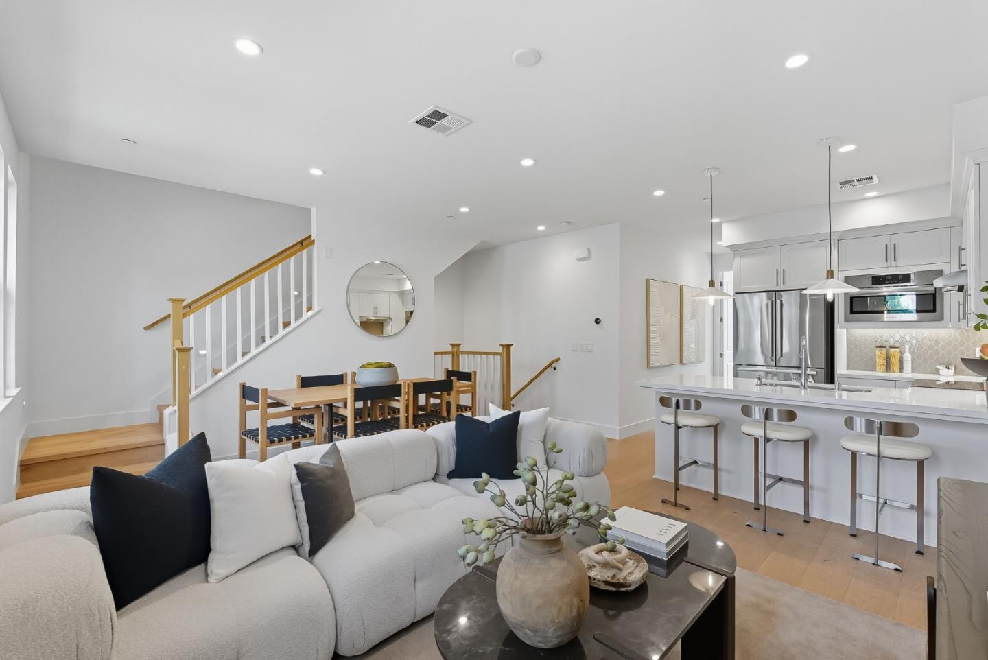 1387 West Middlefield Road Mountain View, CA 94043 - Photo 5 of 28 a living room with furniture kitchen view and a chandelier