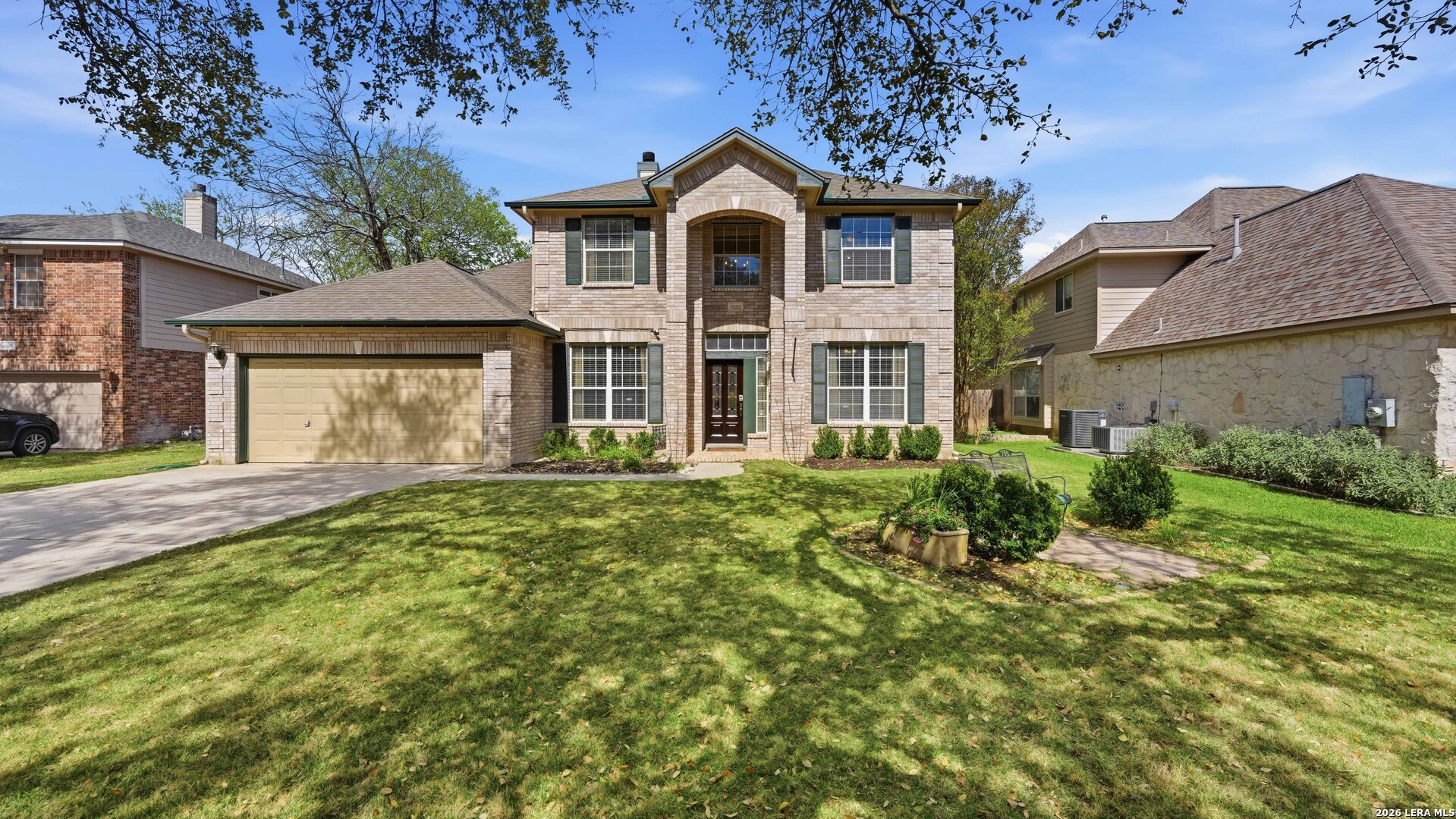 4520 Ridge Peak Drive Schertz, TX 78154 - Photo 2 of 44 front view of a house with a yard