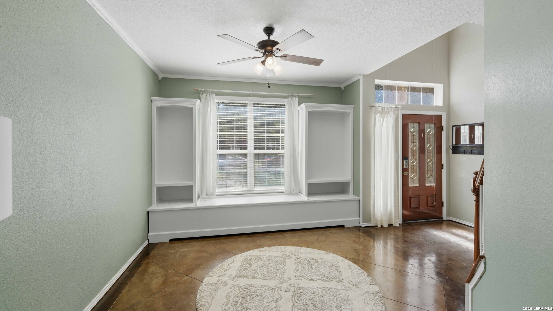 4520 Ridge Peak Drive Schertz, TX 78154 - Photo 21 of 44 an empty room with window and a ceiling fan