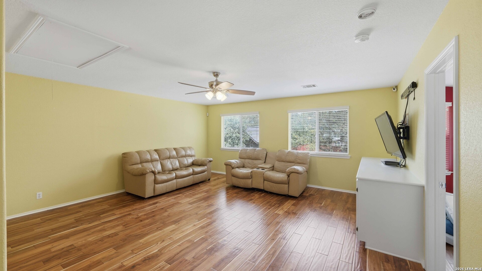 4520 Ridge Peak Drive Schertz, TX 78154 - Photo 28 of 44 a living room with furniture and a large window