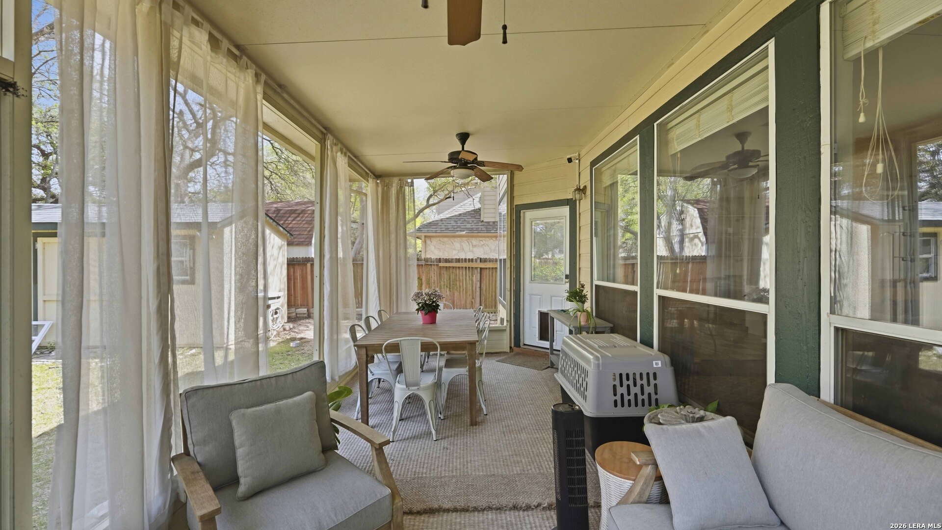 4520 Ridge Peak Drive Schertz, TX 78154 - Photo 32 of 44 a dining room with furniture and a floor to ceiling window