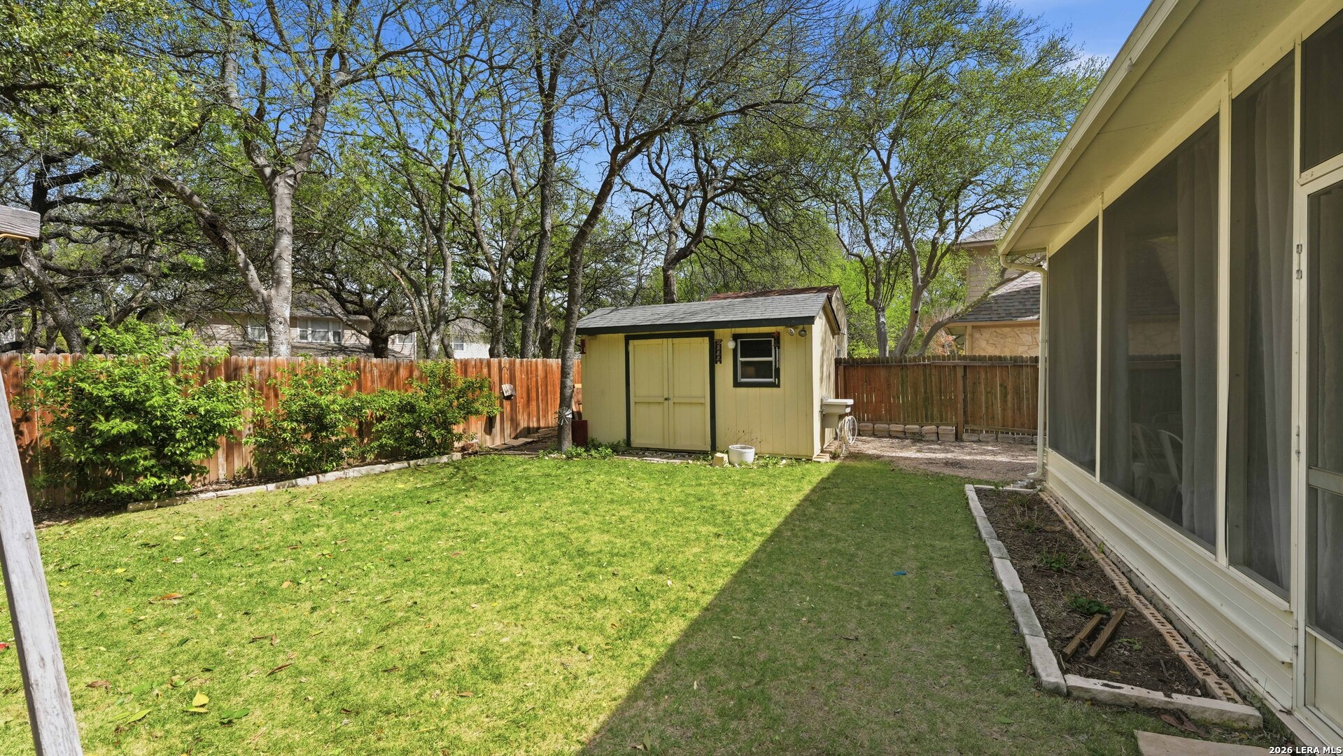 4520 Ridge Peak Drive Schertz, TX 78154 - Photo 38 of 44 a backyard of a house with seating space