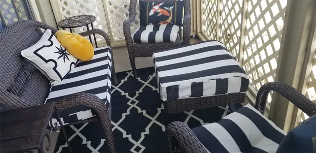 a view of a patio with a yard