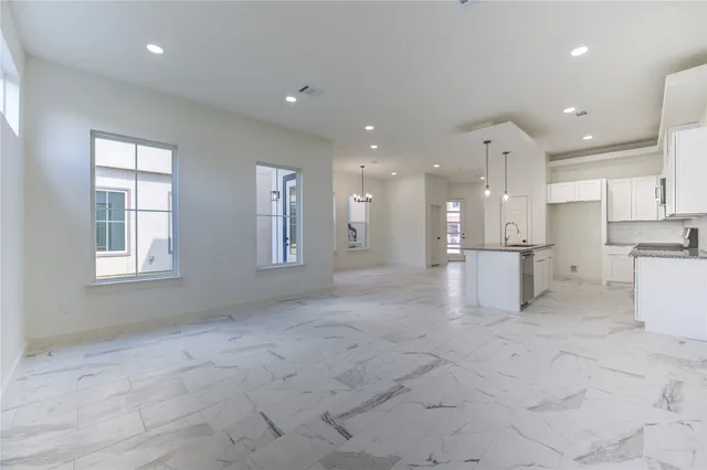 a view of kitchen with windows
