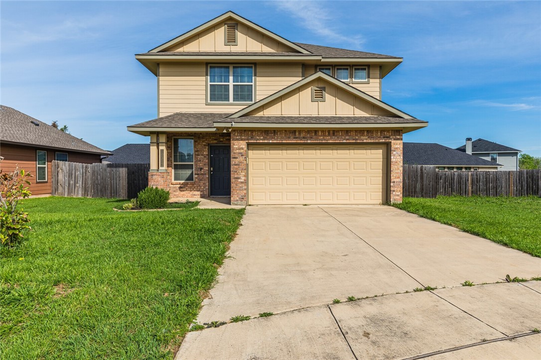 10312 Walley Way Waco, TX 76708 - Photo 1 of 1 a front view of a house with a yard and garage