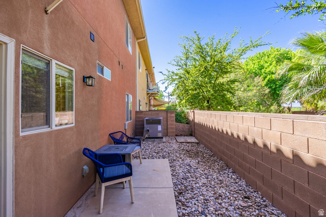 700 North Main Street, Unit F3 Washington, UT 84780 - Photo 27 of 34 Private outdoor patio featuring a concrete slab and gravel landscaping