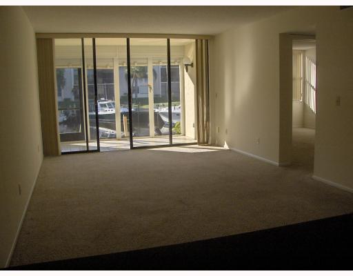 1950 Southwest Palm City Road, Unit 9104 Stuart, FL 34994 - Photo 3 of 8 a view of a room with a large window