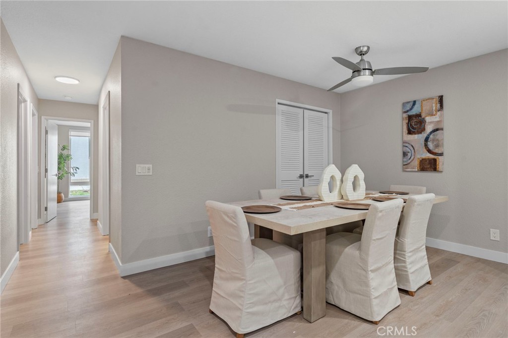 664 Tamarack Avenue, Unit 6 Carlsbad, CA 92008 - Photo 9 of 23 a view of a dining room with a table and chairs