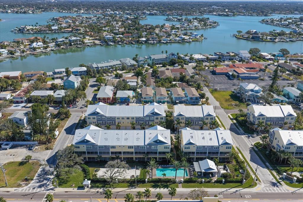 2516 Coral Court Indian Rocks Beach, FL 33785 - Photo 19 of 69 an aerial view of a city with lots of residential buildings ocean and mountain view