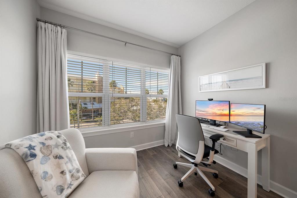 2516 Coral Court Indian Rocks Beach, FL 33785 - Photo 44 of 69 a living room with furniture and a window