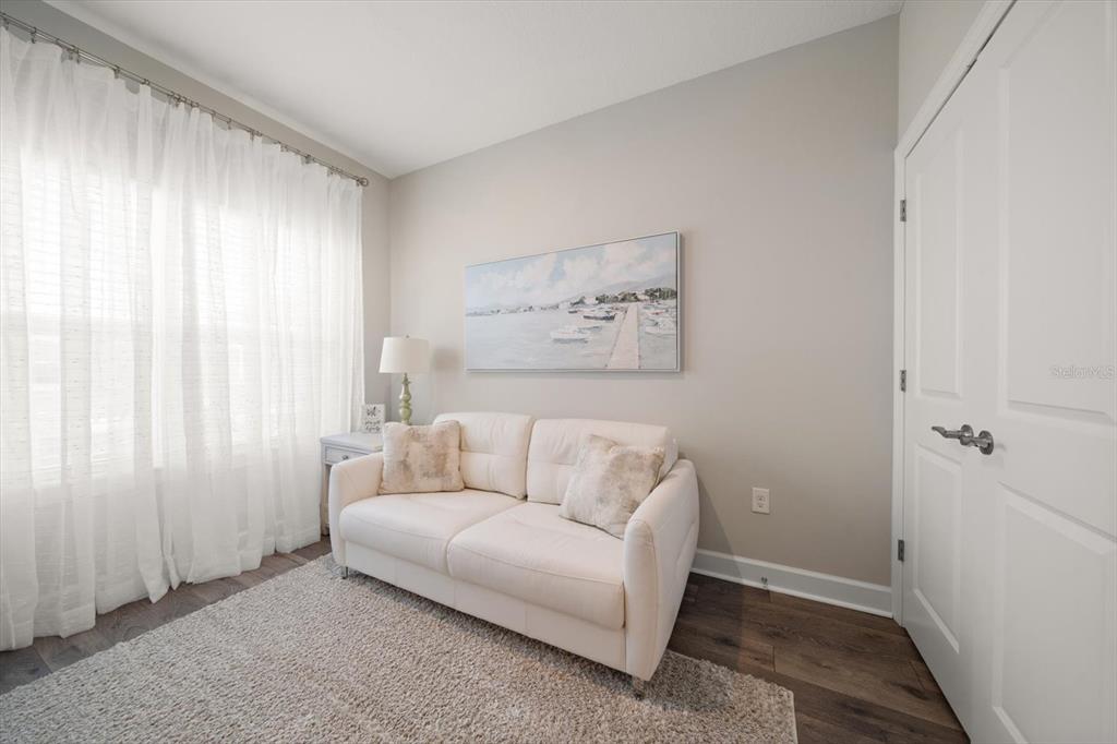 2516 Coral Court Indian Rocks Beach, FL 33785 - Photo 55 of 69 a living room with furniture and a window