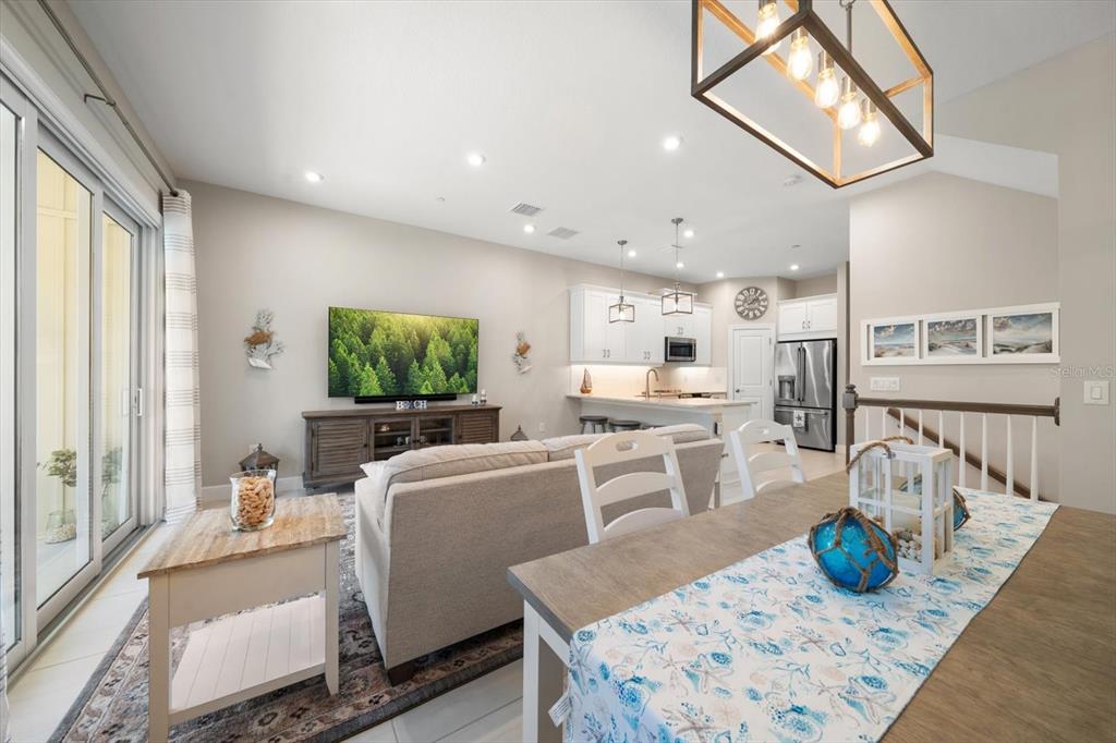 2516 Coral Court Indian Rocks Beach, FL 33785 - Photo 9 of 69 a living room with furniture a window and kitchen view