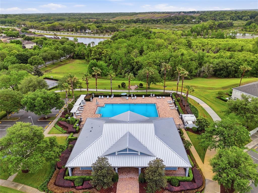 877 Haring Lane Mount Dora, FL 32757 - Photo 26 of 26 an aerial view of a house with a yard lake view and mountain view