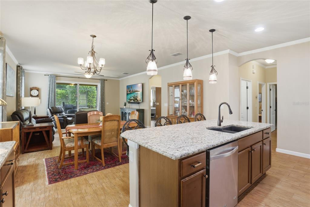 877 Haring Lane Mount Dora, FL 32757 - Photo 4 of 26 a view of a dining room and livingroom view