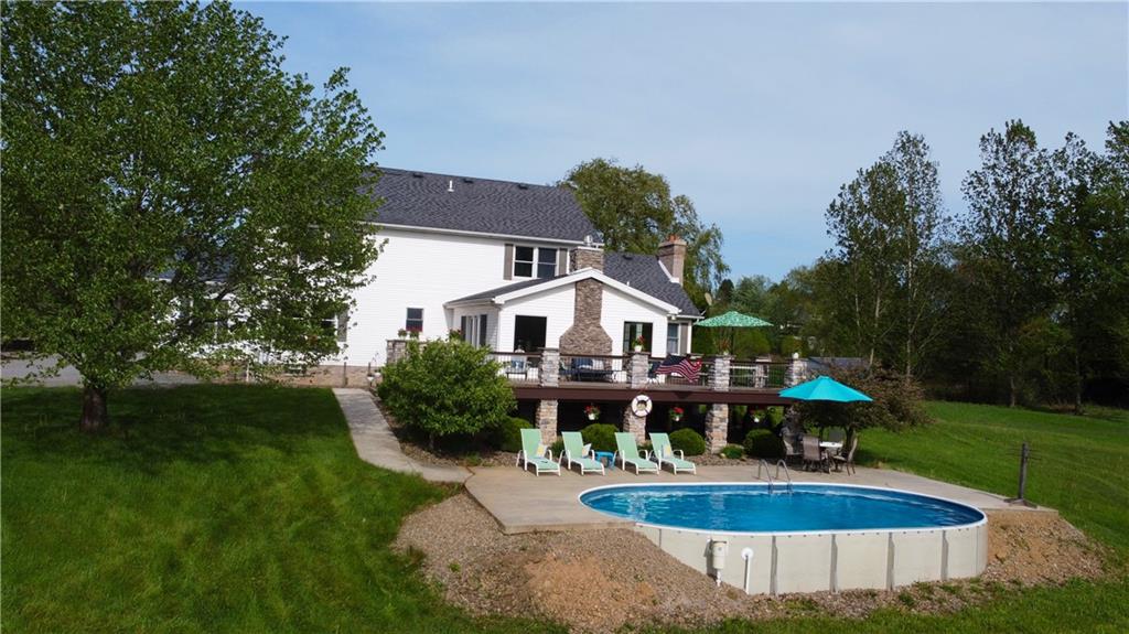 259 Old Mercer Road Volant, PA 16156 - Photo 3 of 45 a view of a house with swimming pool and sitting area
