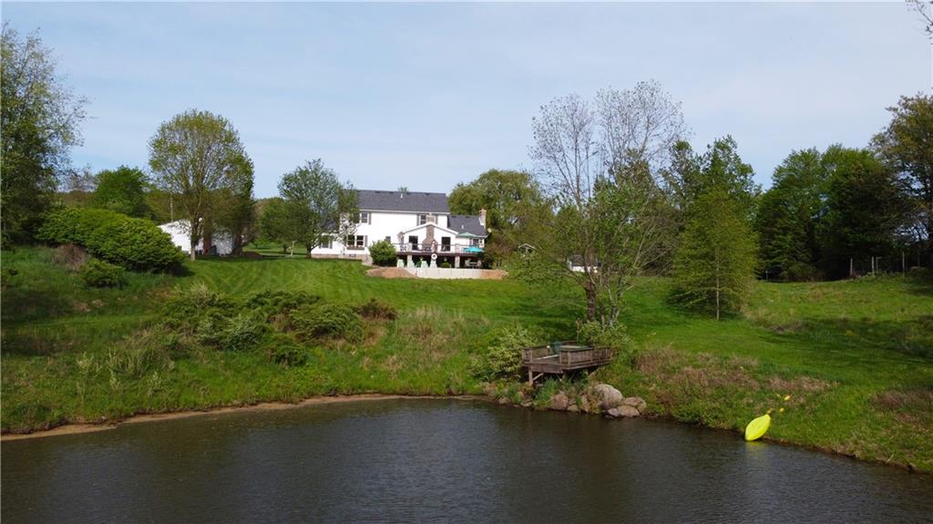 259 Old Mercer Road Volant, PA 16156 - Photo 5 of 45 a view of a golf course with chairs