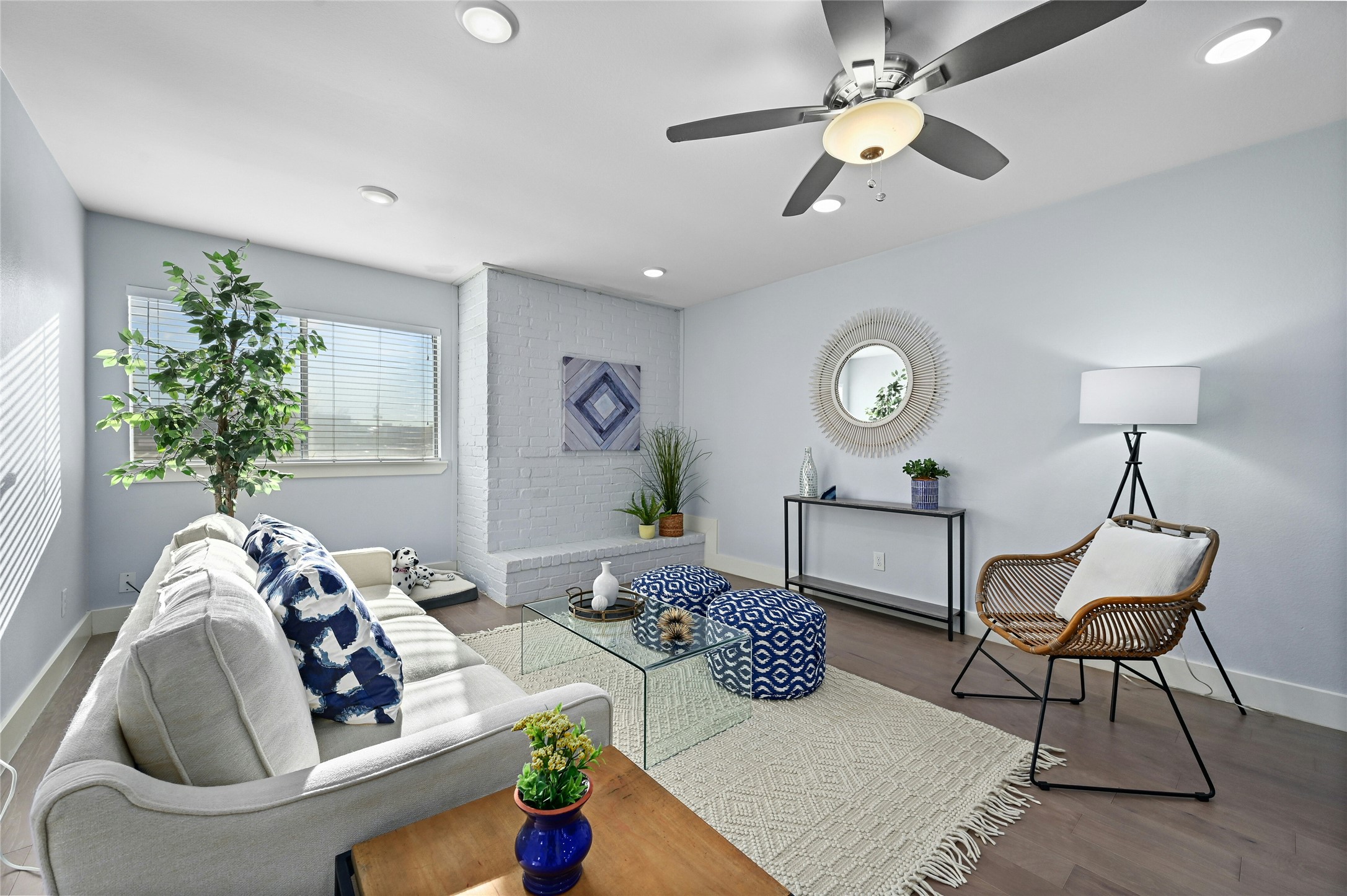 909 Reinli Street, Unit 228 Austin, TX 78751 - Photo 9 of 27 a living room with furniture and a window