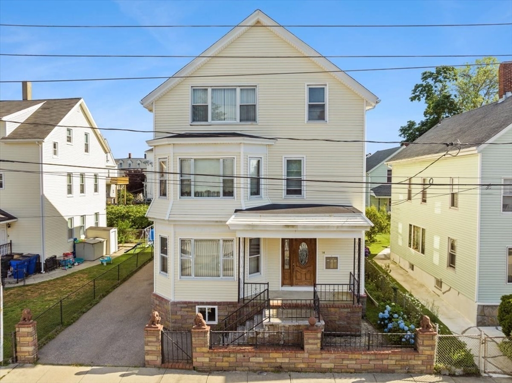 14 Grinnell Street Fall River, MA 02721 - Photo 1 of 41 a front view of a house with a yard