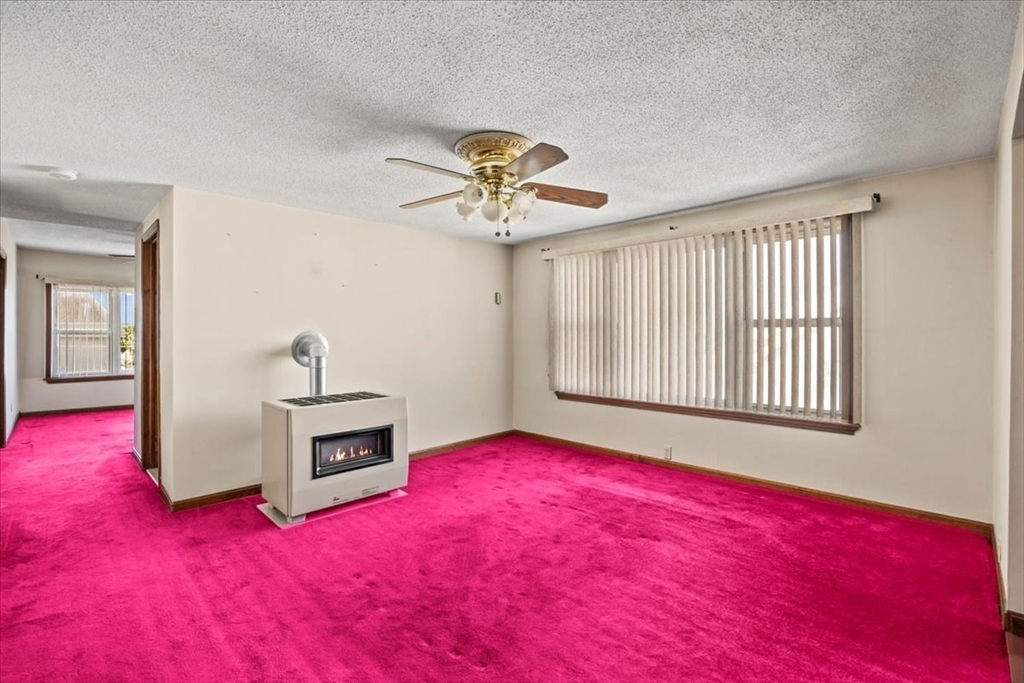 14 Grinnell Street Fall River, MA 02721 - Photo 27 of 41 a view of livingroom with hardwood floor and a ceiling fan