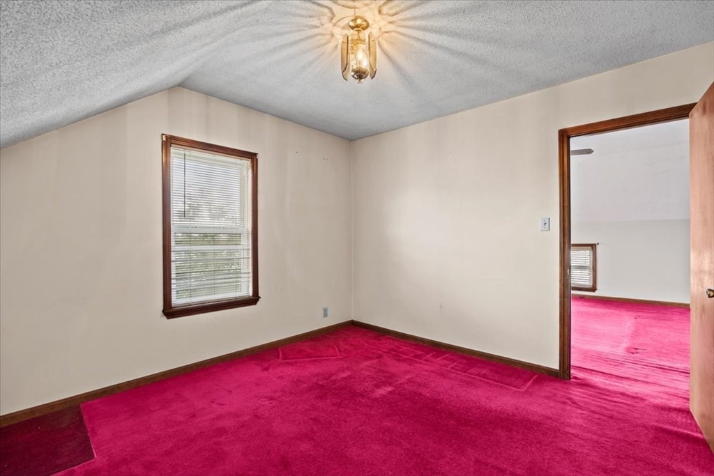 14 Grinnell Street Fall River, MA 02721 - Photo 41 of 41 an empty room with windows and closet