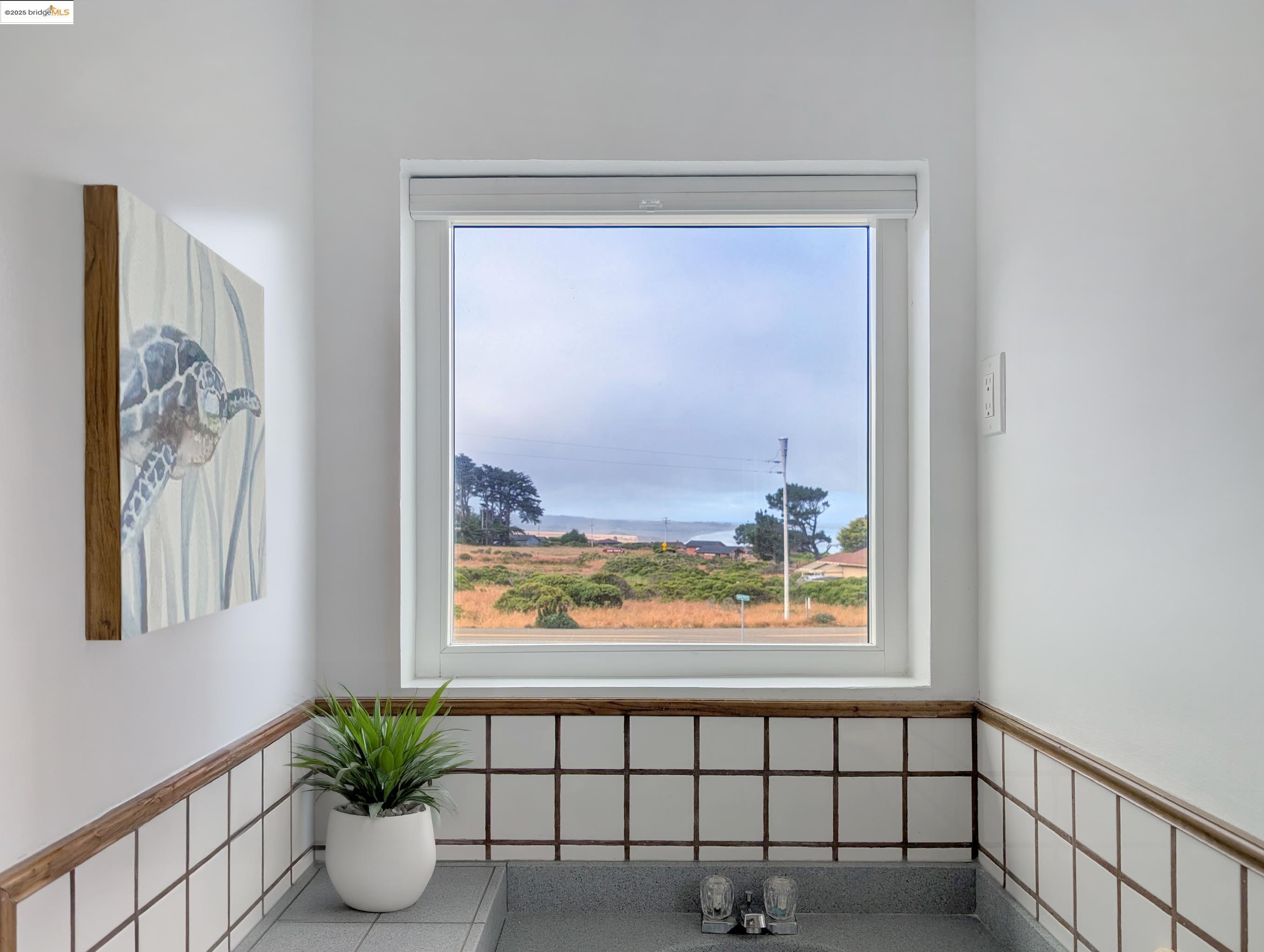 14771 Cypress Point Road Manchester, CA 95459 - Photo 21 of 36 a view of a porch with a potted plant