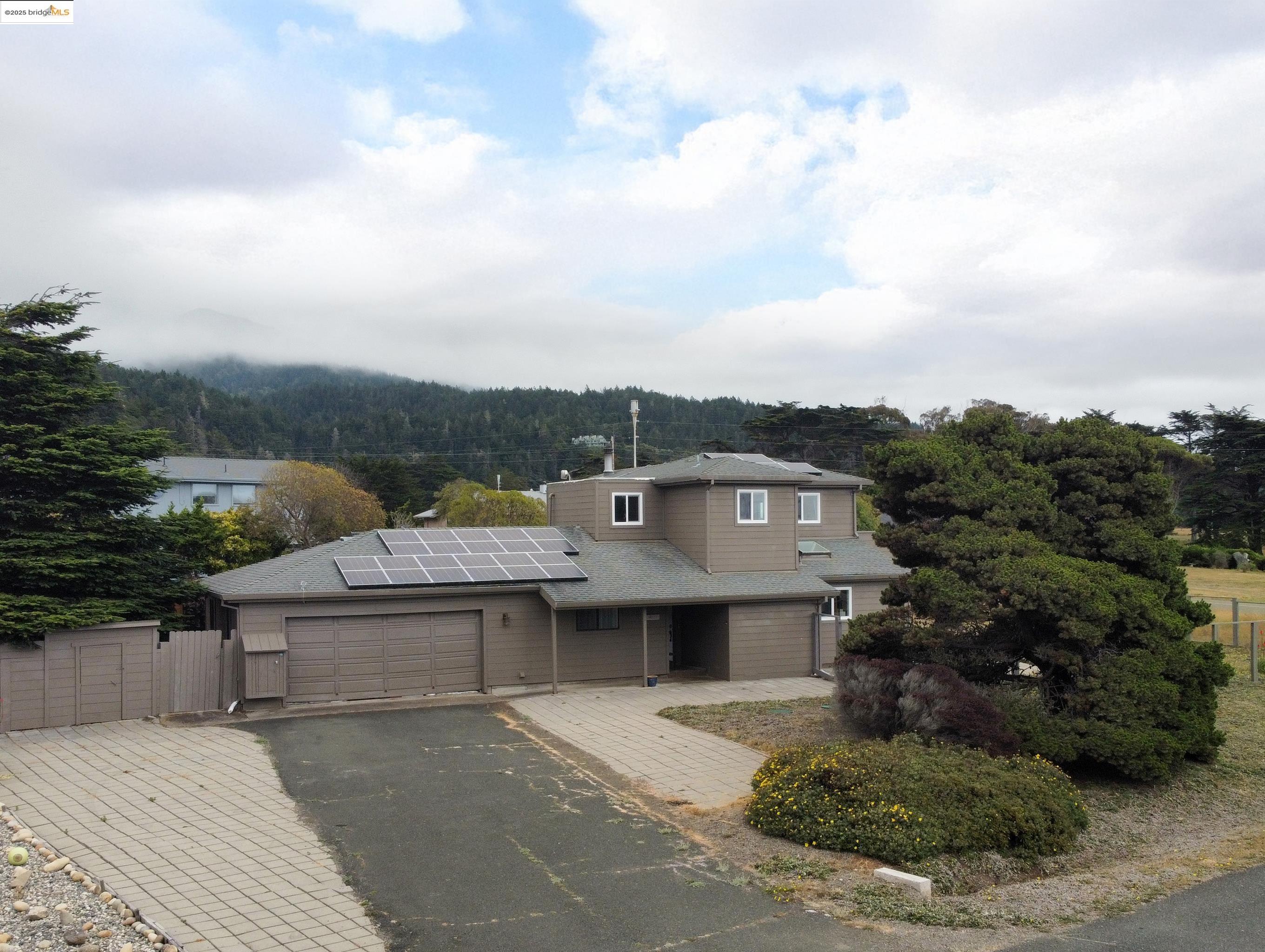14771 Cypress Point Road Manchester, CA 95459 - Photo 22 of 36 a view of a house with a yard