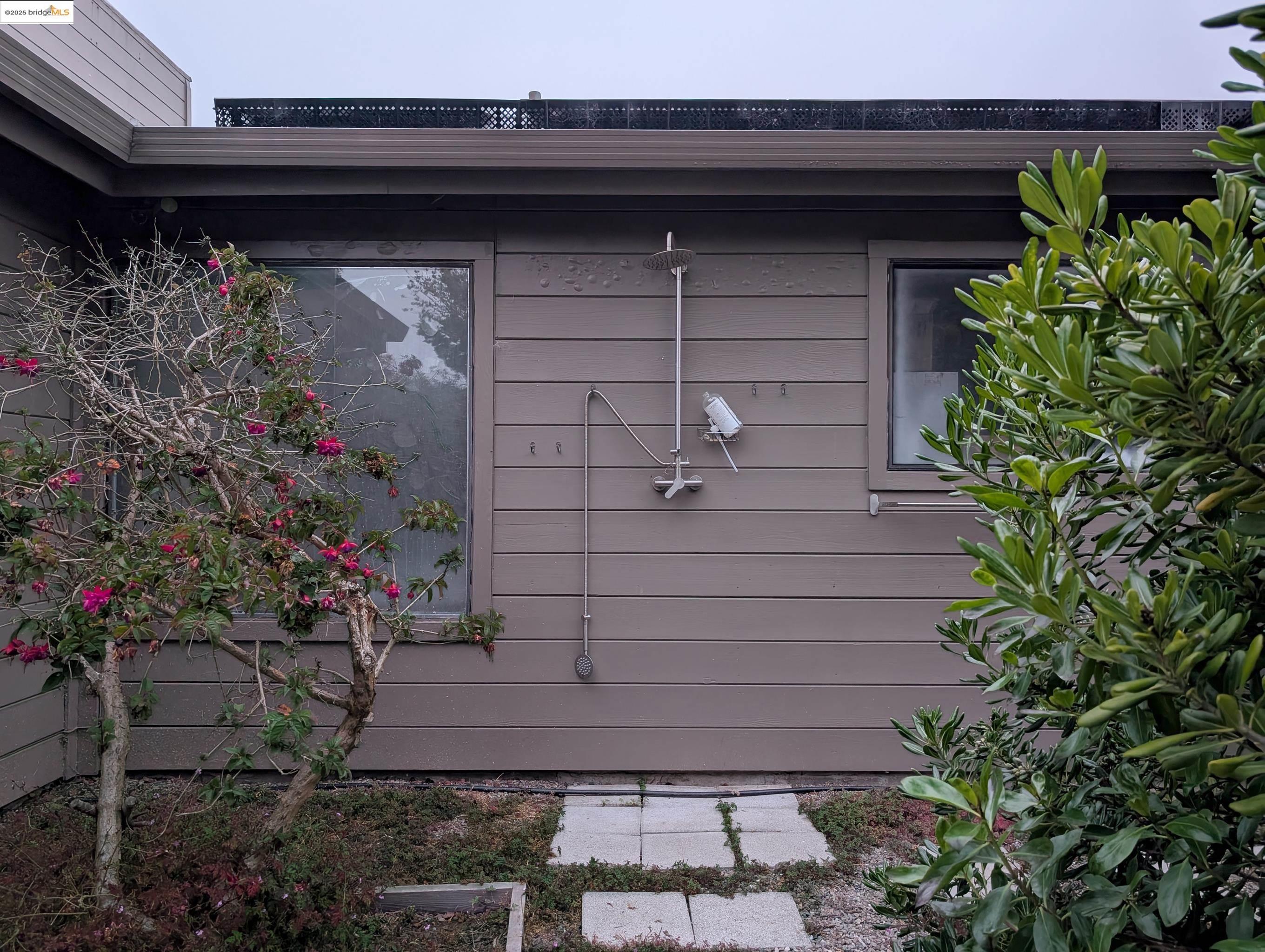 14771 Cypress Point Road Manchester, CA 95459 - Photo 24 of 36 a view of house with a flower garden