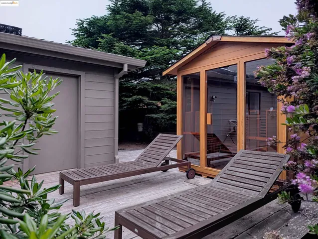 a backyard of a house with lots of green space