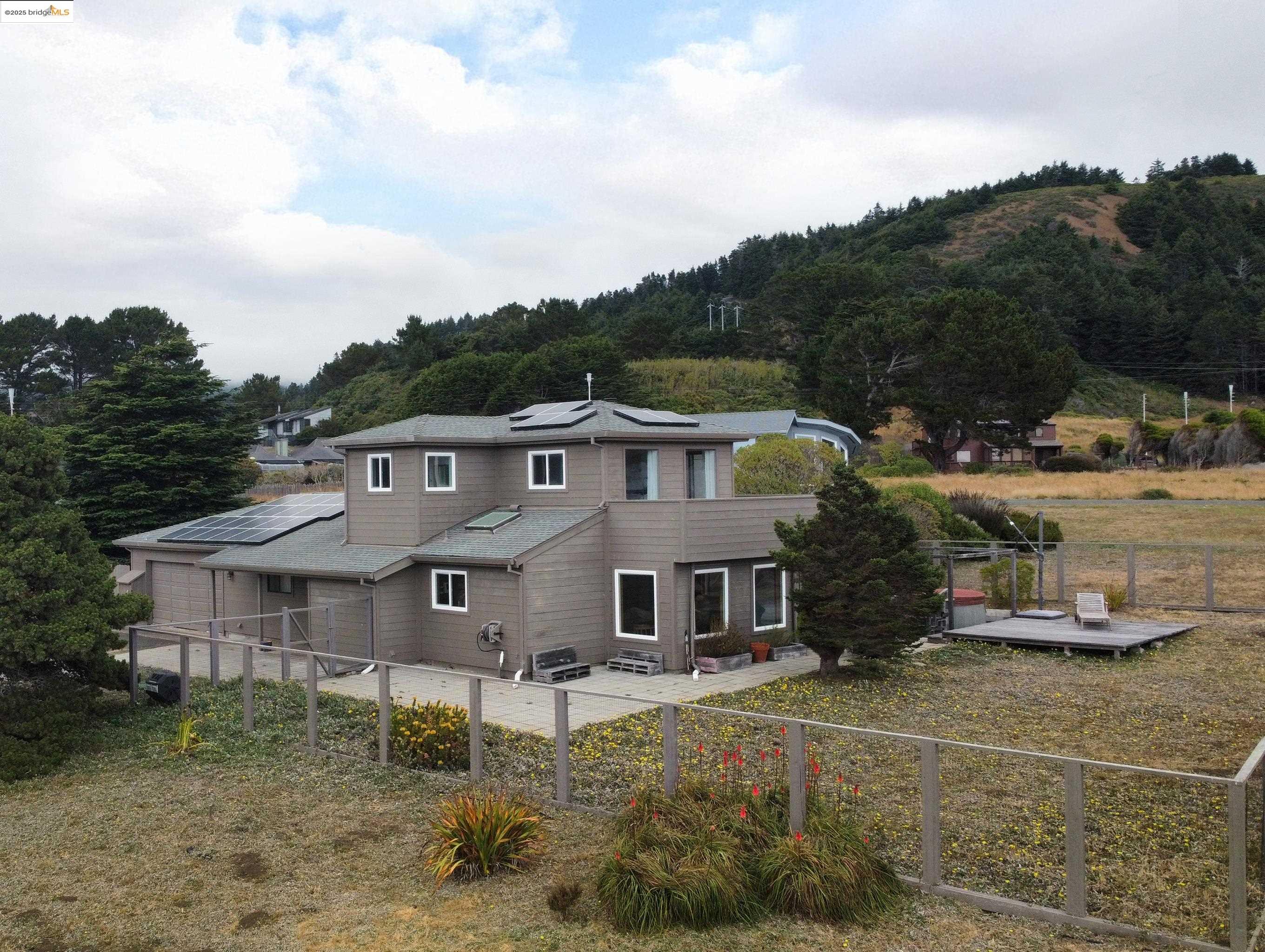 14771 Cypress Point Road Manchester, CA 95459 - Photo 34 of 36 a aerial view of a house next to a yard