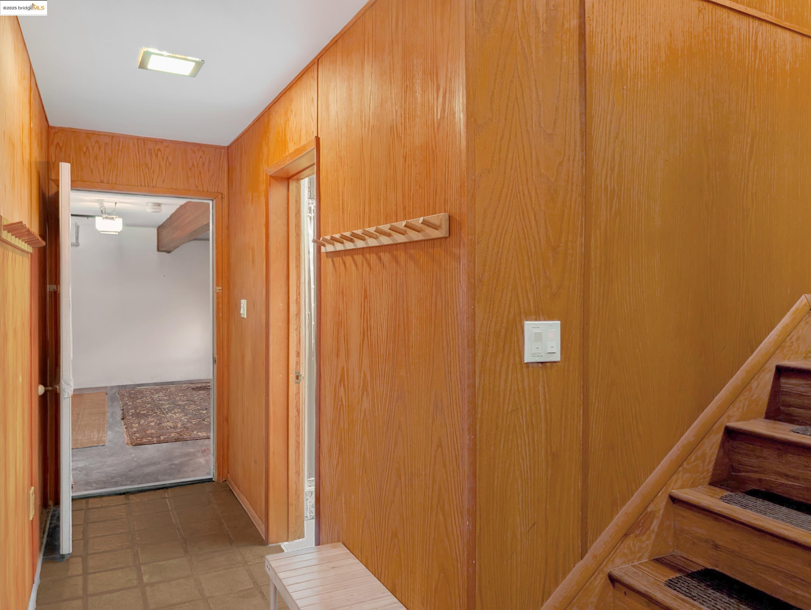 14771 Cypress Point Road Manchester, CA 95459 - Photo 9 of 36 Hallway featuring wooden walls