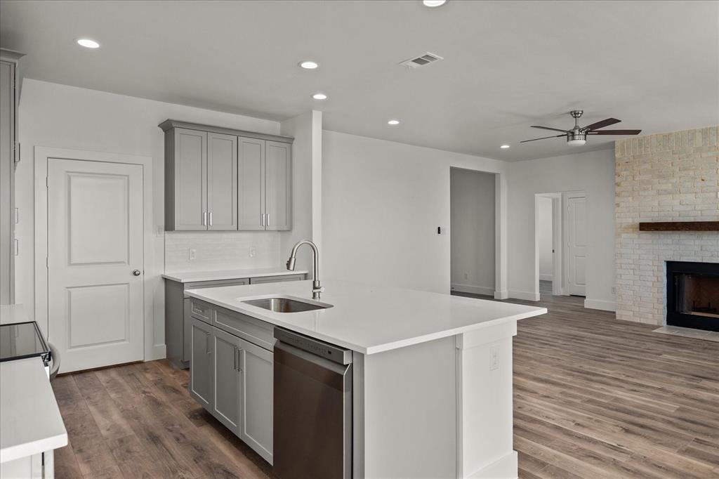3232 Willow Road Celeste, TX 75423 - Photo 12 of 31 a kitchen that has a sink and a stove in it