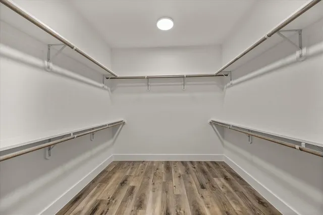 a view of an empty walk in closet